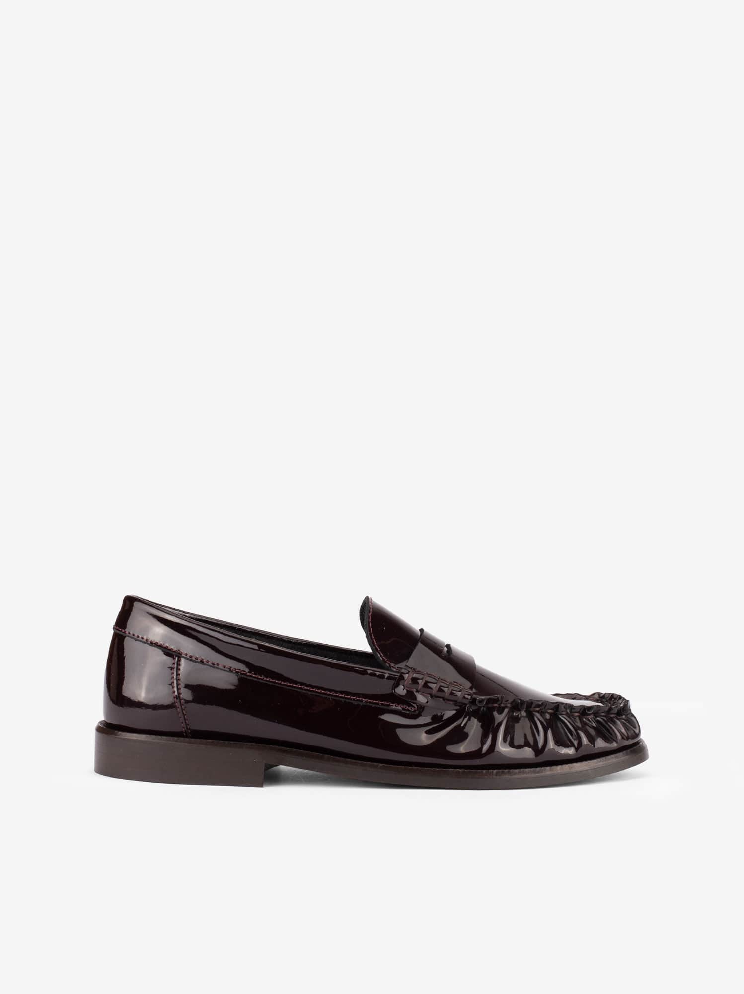 Sapato Penny Loafer em Pele